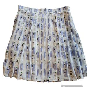 Anthropologie Harlyn Pleated Skirt with Women in Bathing Suits